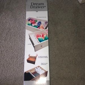 DREAM DRAWER; spring loaded drawer divider